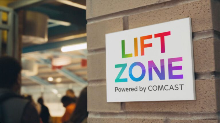 Lift Zone by Comcast logo on a wall.