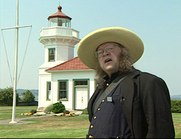 Man in front of Mukilteo lighthouse