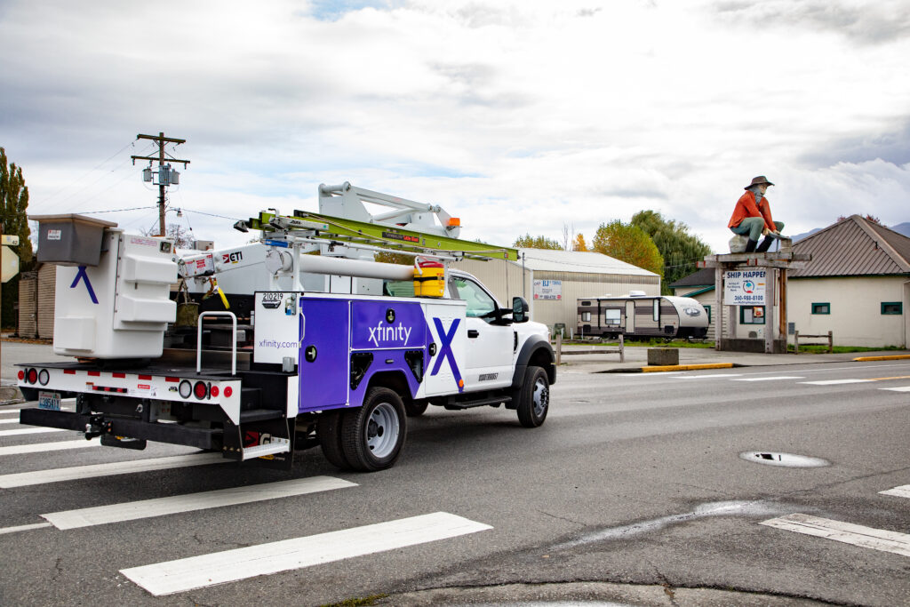 An Xfinity truck drives through downtown Sumas.