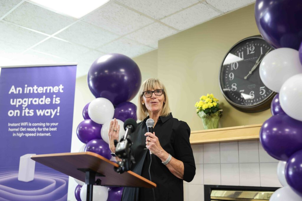 Missy Staples Thompson, SPHA Board chair, speaks during Xfinity’s event for the first collaboration with the St. Paul Public Housing Agency at the Central Hi-Rise apartments in Saint Paul, Minnesota.