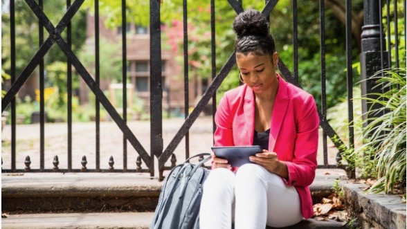 An Oakland University student uses her tablet.