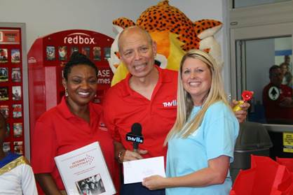 Three attendees at Heart of Arkansas United Way Back to School Blitz Supply Drive.