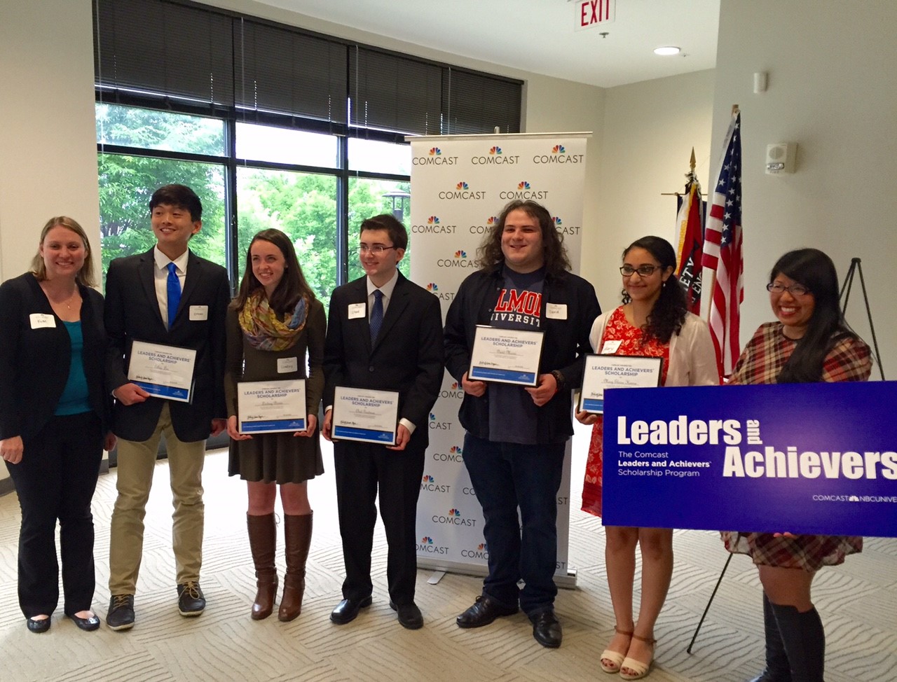 Leaders and Achievers® Scholarship Program participants holding certificates.