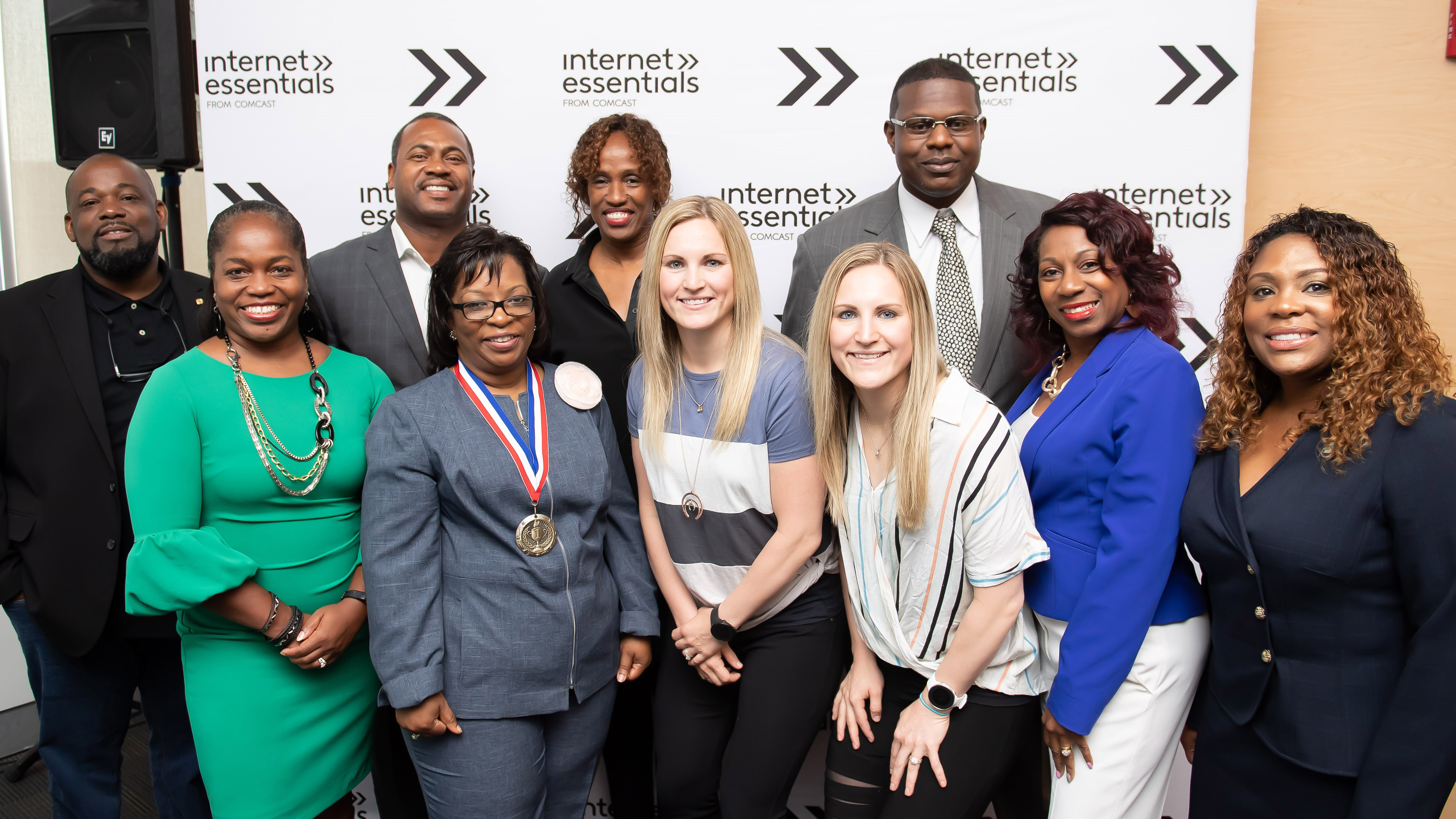 Jocelyne Lamoureux-Davidson and Monique Lamoureux-Morando and Memphis Leaders at an Internet Essentials event.