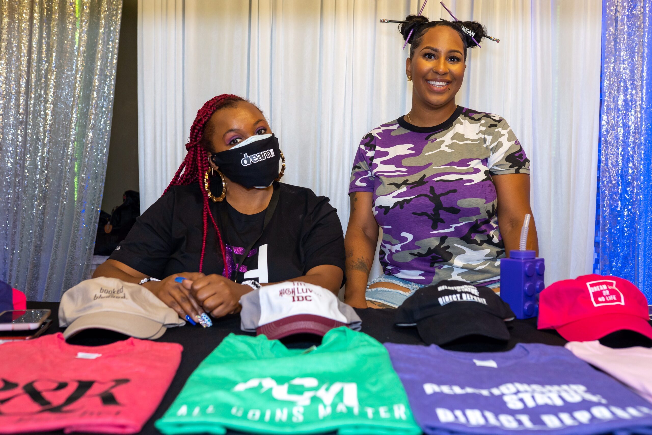 Comcast RISE grant recipients 'Dream Life' sitting behind a table.