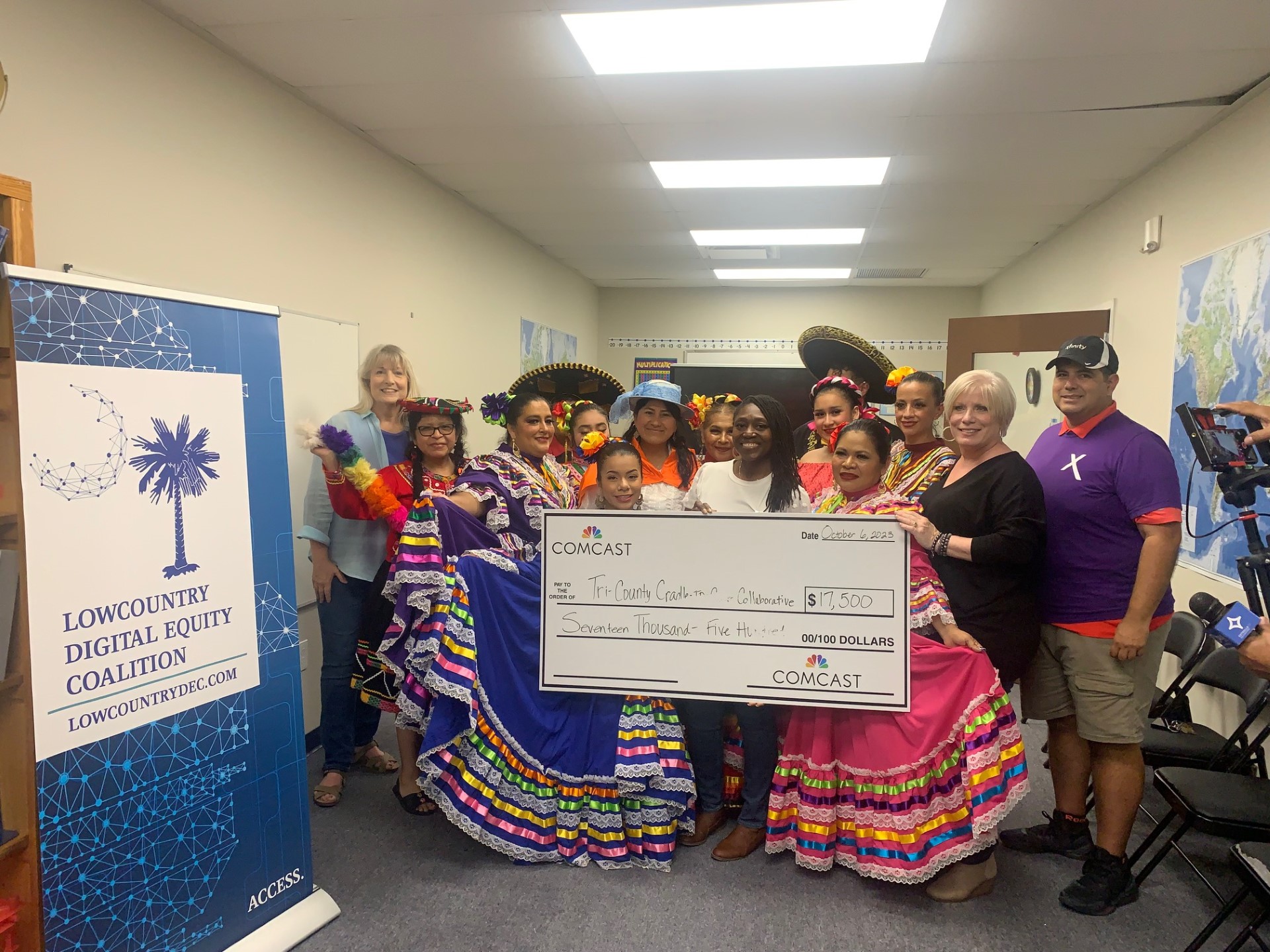 Comcast and Tri-County Cradle to Career Collaborative representatives celebrate the grant on Friday, October 6 at a Hispanic heritage and digital inclusion fiesta sponsored Xfinity and Lowcountry Digital Equity Coalition.