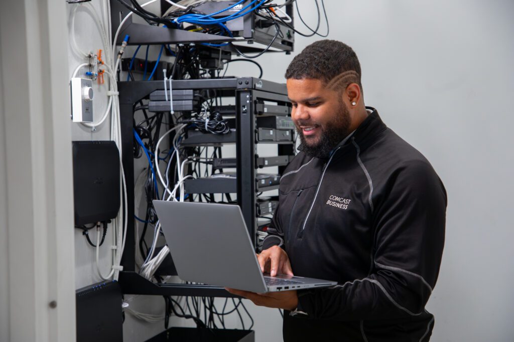 Technician works on equipment at Inspiredu's Lift Zone