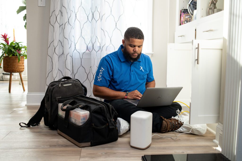 Technician working inside a home