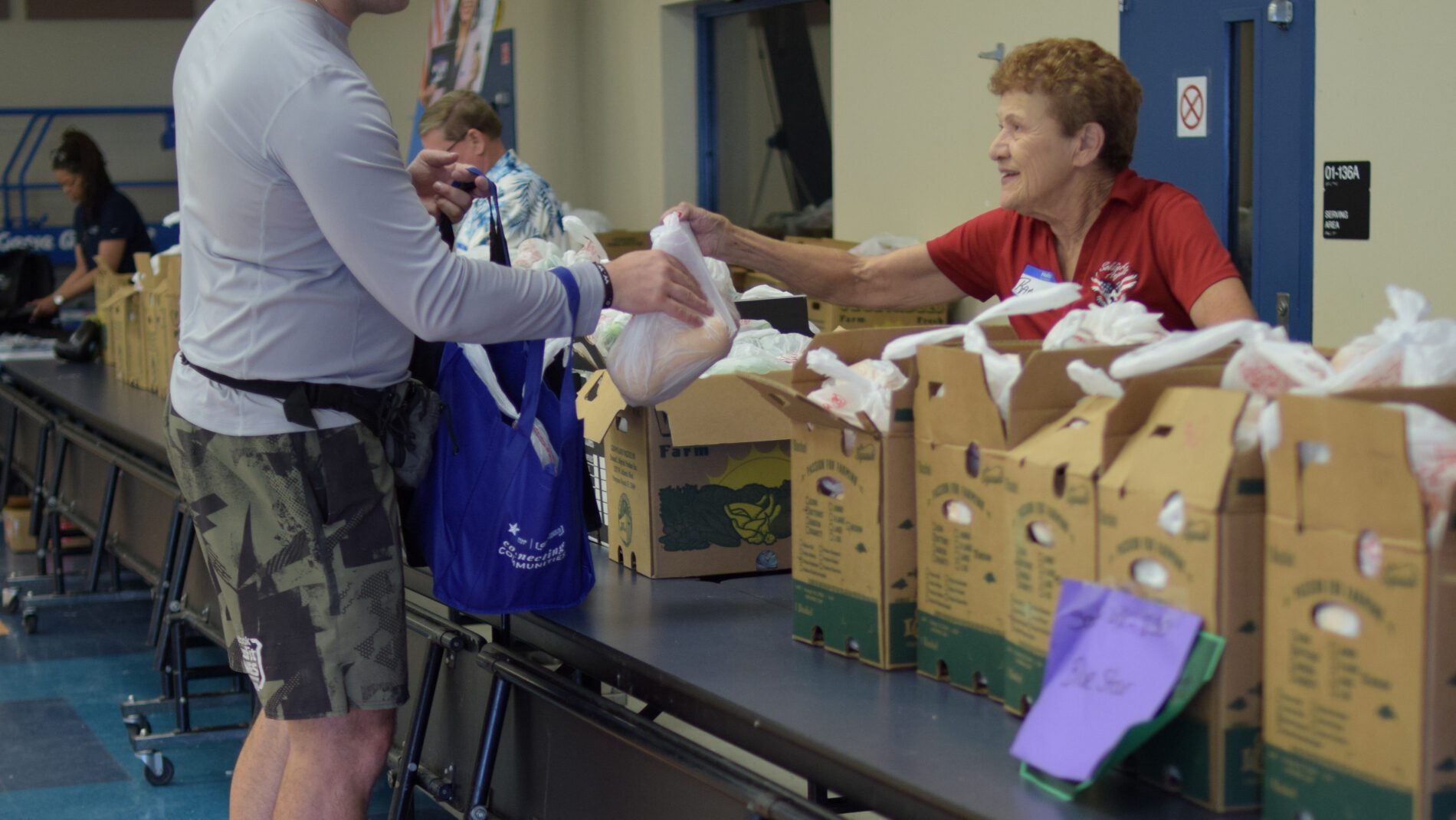 Woman handing out food