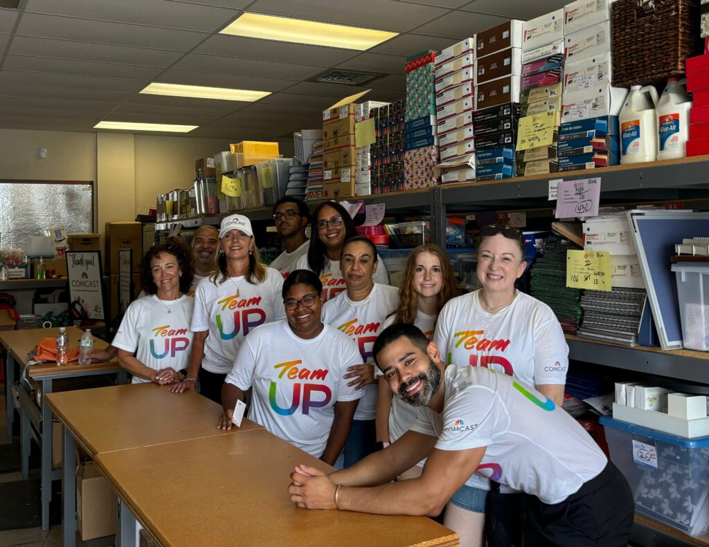 volunteers pose for a picture