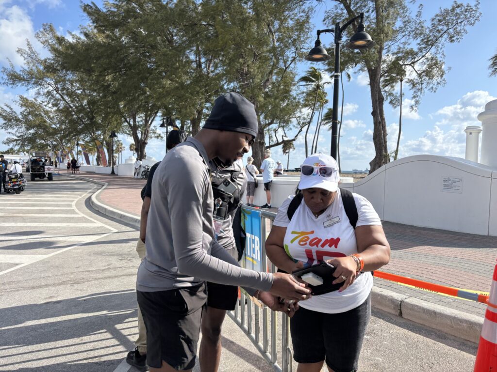 woman registering a man at an event