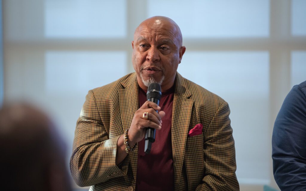 panelist speaking at an event