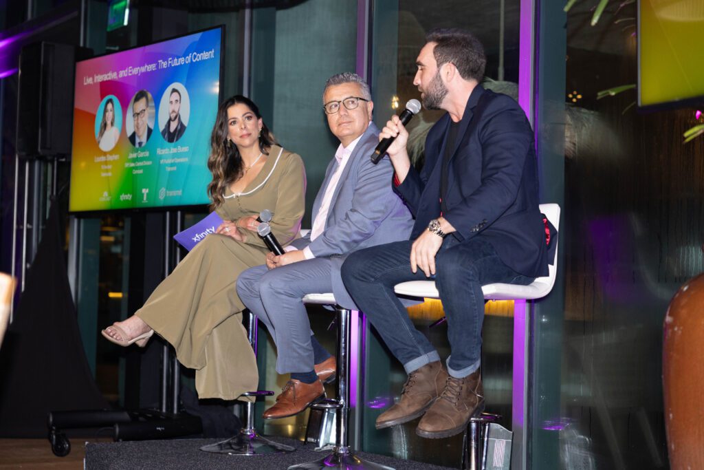 Man speaking at a panel discussion