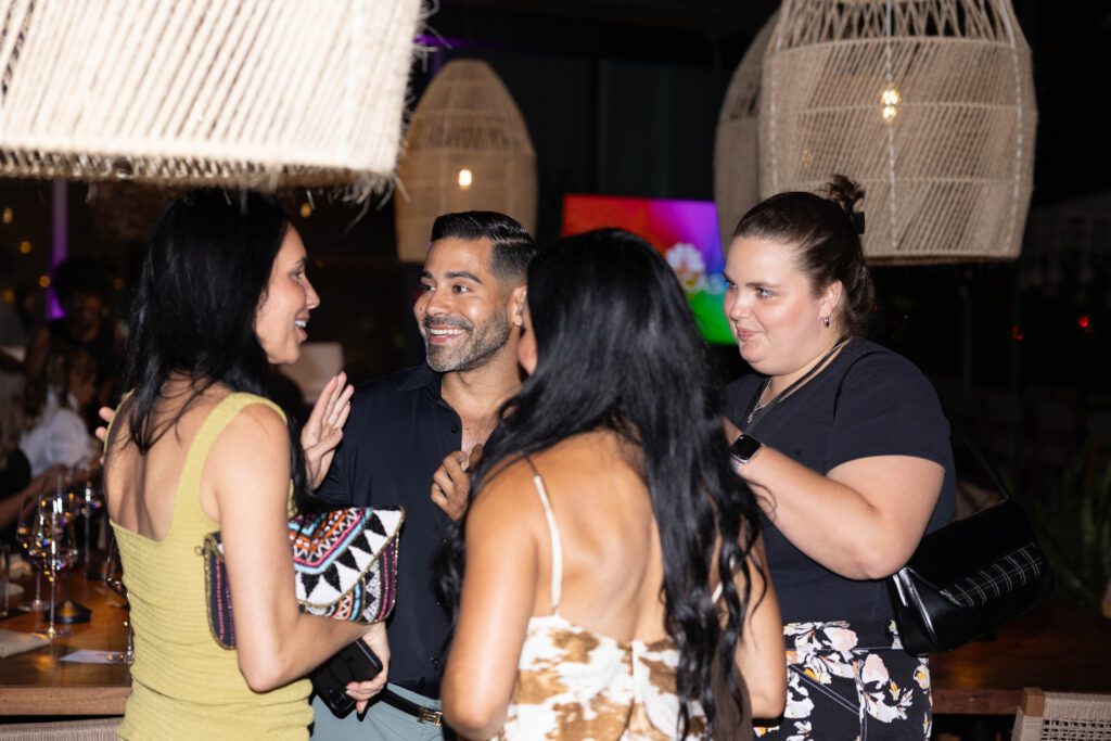 People having a conversation at an event