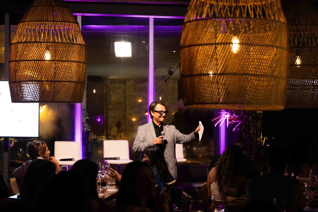 Man speaking at a panel discussion