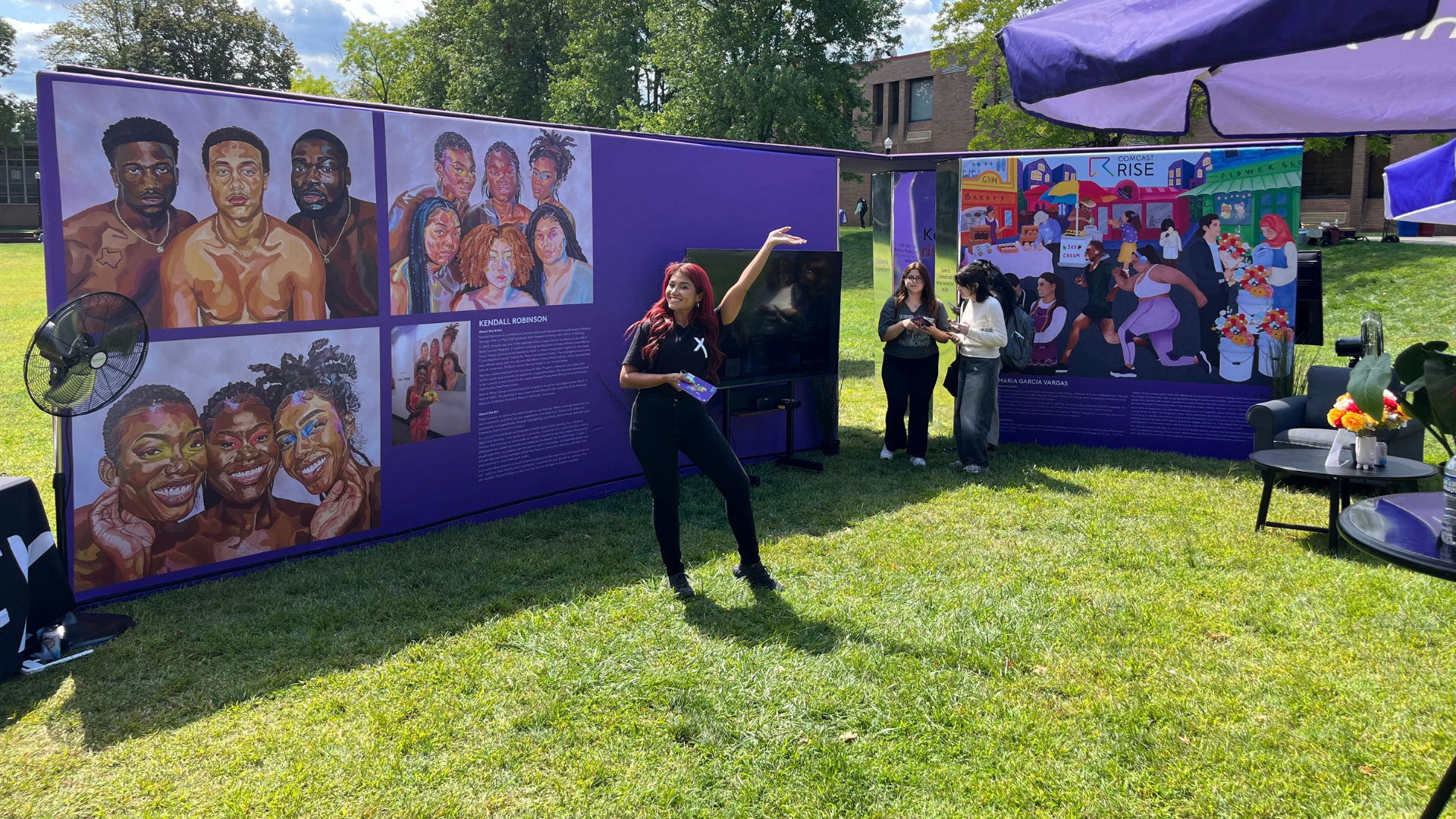 Rep in front of Unity Tour display.