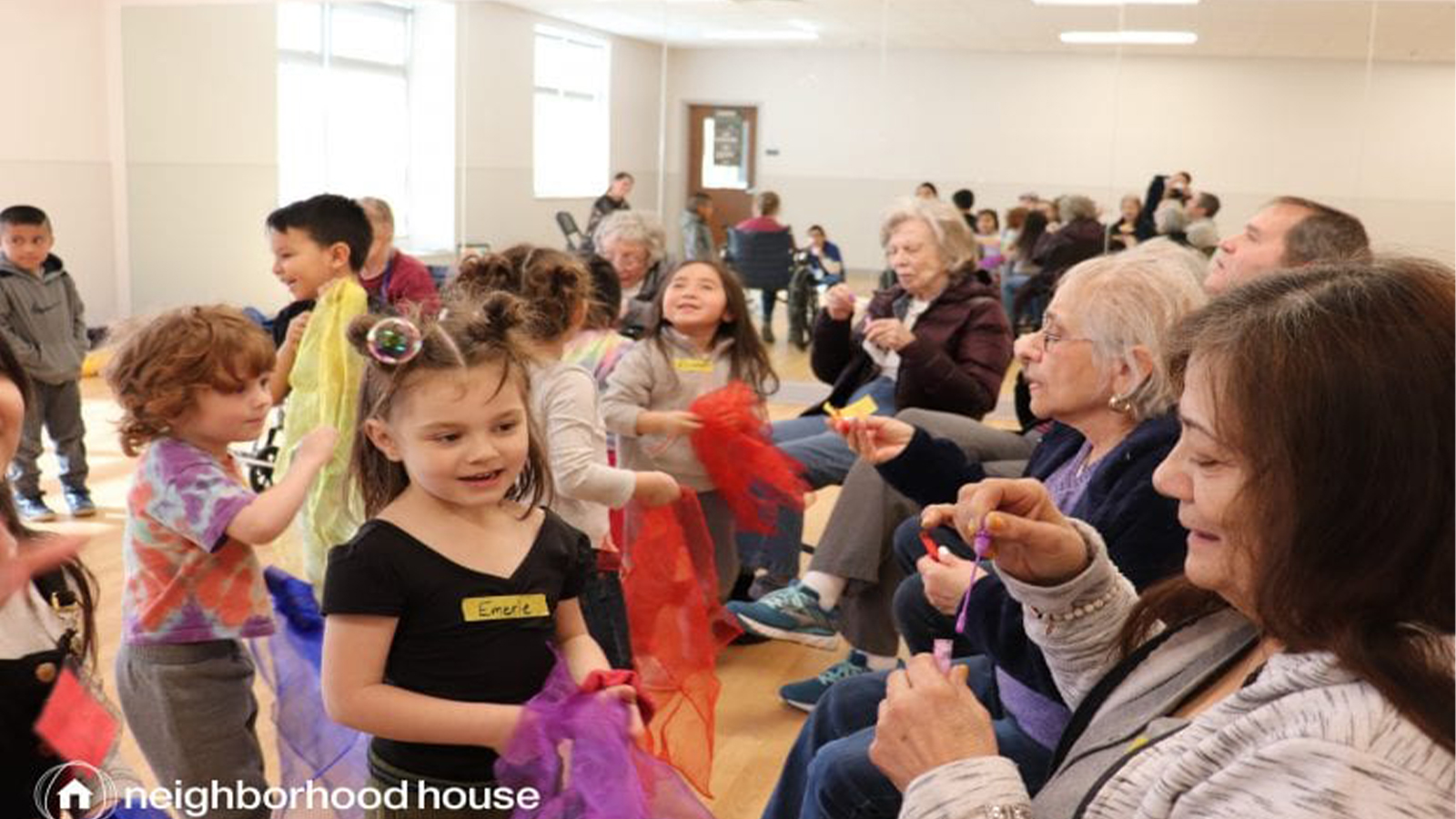 Seniors and young children gathered.