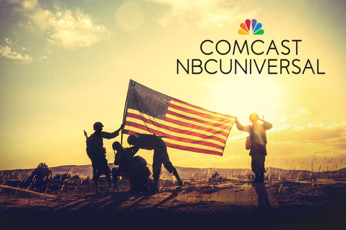 Soldiers holding American flag.